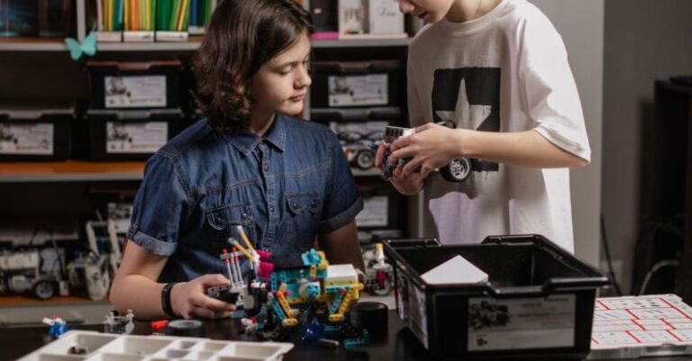 Educational Robots - Teenagers Assembling Lego Education Robots