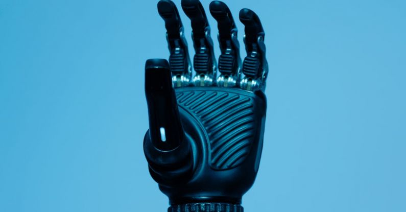 Robot Arm - Prosthetic Arm on Blue Background
